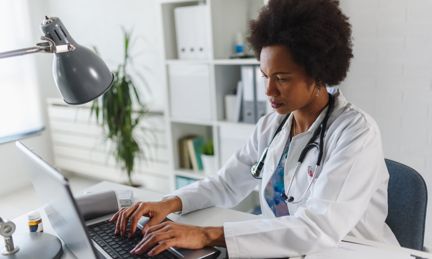 Doctor on computer